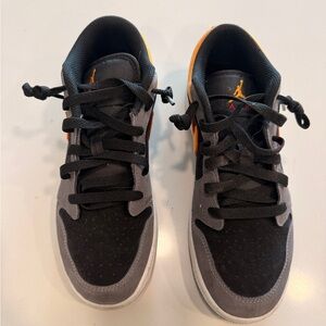 Blacj and Orange Nike Jordan’s